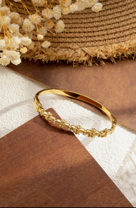 Bracelet jonc fleurs scintillantes