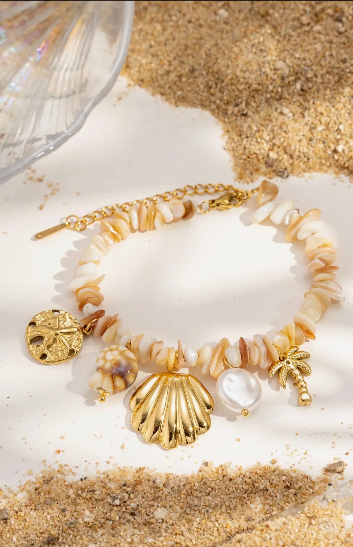 Bracelet Perles Coquillages Naturels
Charms Acier Inoxydable
