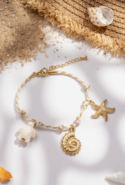 Bracelet acier cordon tressé tortue coquillage étoile de mer